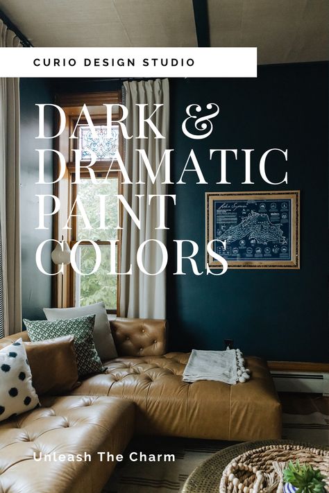 Prepare to transform your space this cozy season with our top favorite fall inspired paint colors. Explore the magic of dark, moody hues to add ambiance to your living space. Also, discover how even without paint, dark accent rugs or throw pillows can start the transformation. Dark Living Room Color Palette, Moody Paint Schemes, Moody Colors Living Room, Dark Moody Living Room Paint Colors, Dark Paint For Living Room, Dark Blue Ceiling Living Room, Moody House Colors, Moody Teal Paint Colors, Dark Knight Paint Sherwin Williams