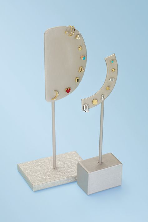 This beautiful earring display can give your showcase a pop of color, elegance, or a mix of both! Piercing Display, Marble Furniture Design, Minimalist Jewelry Display, Fine Jewelry Display, Jewelry Store Displays, Earring Displays, Trending Earrings, Earrings Display, Earring Display Stands