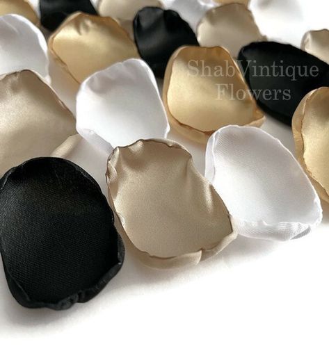 Black, Gold, Champagne, and White Flower Petals #black #gold #classywedding #Christmaswedding #reception #tabledecor https://t.co/1f0P7av9pU #weddingvibes #bohostyle #rusticwedding #weddingideas #partydecor #flowergirl #groomtobe #bridetobe2025 #weddings #bridalshower #weddingaisledecor #loveislove #flowers #weddingday #bridetobe2024 #groomtobe2025 Champagne And Black Wedding, White Flower Petals, Gold Wedding Decorations, Wedding Aisle Decorations, Gold Champagne, Champagne Wedding, Classy Wedding, October 5, Pearl Wedding