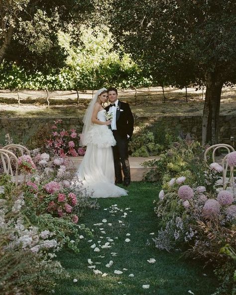 Sophia Goff Events + Design on Instagram: "The most vibrant, playful and chic summer ceremony for Morgan & Luke! Congratulations to the newlyweds, we adore you! 🤍

Photo // @samanthadeanwed 
Design & Planning // @sophia.goff 
Florals // @found.floral 
Cinema // @sarahdavis 
Venue // @carmelvranch 
Stationery // @gemtones 
Production // @casario
Beauty // @blushmonterey 
Lighting // @gotlightsf 
Dress // @verawangbride 
Rentals // @theonicollection @foundrentalco 
Entertainment // @dartcollective" Sophia Goff, Summer Ceremony, Events Design, Chic Brides, Adore You, Design Planning, Event Design, Stationery, Entertainment