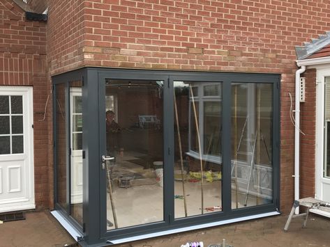 This corner post Origin bi fold door was fitted by our team in a customers dining room to allow more light to pass into the property. #BiFoldDoor #BifoldDoor #BiFolds #CornerBiFoldDoor #CornerPostBiFoldDoor #CornerPost #AnthraciteGrey #ThreePaneBiFoldDoor #OriginBiFoldDoor #OriginBiFold #OriginBiFolds  #Basfords #BasfordsEffect #BasfordsDifference Grey French Doors, Corner Bifold Doors, Bi Fold Doors, Garden Room Extensions, Corner Door, Glass Doors Patio, Bi Fold Door, Room Extensions, Open Plan Kitchen Living Room