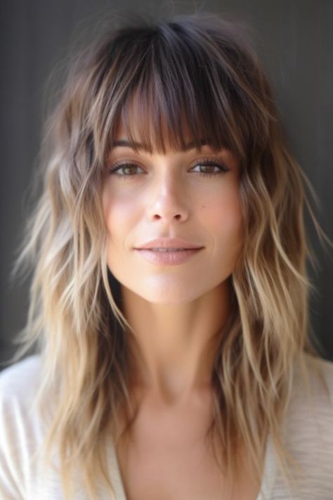 Embrace the shaggy long layers with fringe for a relaxed and bohemian look. This layered haircut is ideal for thick hair, offering movement and dimension. Click here to check out more layered haircuts and hairstyles for long hair. Long Hair Framed Face Haircuts, Short Hair Bangs Highlights, Womens Hair With Bangs, Light Brown Shag, Shaggy Long Hair, Blonde Hair Transformations, Long Layered Haircuts, Hairstyles For Medium Length Hair, Long Hair With Bangs