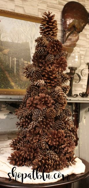 how to build a Giant pinecone tree from a tomato cage -The Blue Building Antiques Alabaster AL shopatblu Christmas Tree Decor Ideas 2023, Vintage Christmas Tree Ideas, Tomato Cage Crafts, Pinecone Tree, Aesthetic Christmas Tree, Pine Cone Christmas Decorations, Tomato Cage Christmas Tree, Pine Cone Tree, Christmas Tree Decor Ideas