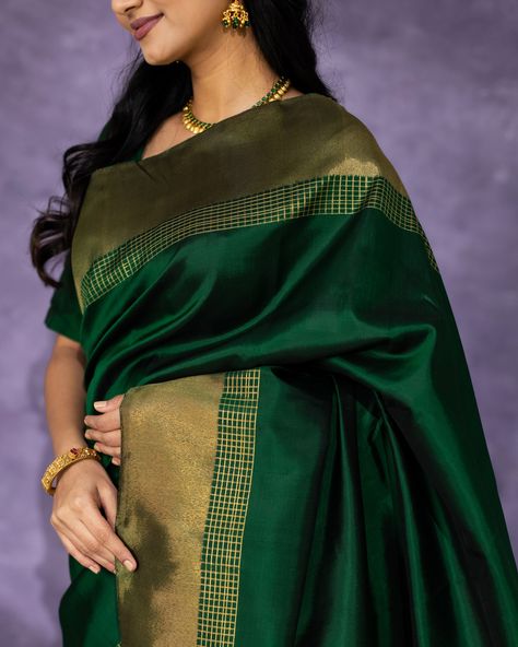 Leila | The Dark Beauty This bottle green Kanjeevaram silk saree has bavanchi border and zari checks interlocked with special double korvai technique. [Summer Collection, Kanchipuram silk saree, Tulsi Silks, Tulsi, Tulsi Weaves, Kanjeevaram Pattu, Handwoven sarees, Kanchipuram, Pure Silk Sarees, Handwoven silk saree, Trending silk saree, bridal silk saree] Bottle Green Silk Saree, Saree Trending, Silk Saree Bridal, Tulsi Silks, Kanjeevaram Silk Saree, Bridal Silk Saree, Green Saree, Kanchipuram Silk Saree, Bottle Green