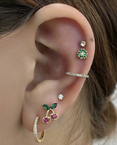 Ear Piercing Ideas Colorful, Colourful Ear Piercings, Colorful Ear Piercings, Colorful Earring Stack, Themed Ear Piercings, Ear Piercing Inspo Aesthetic, Cool Ear Piercings Unique, Pretty Ear Piercings Unique, Multi Ear Piercings