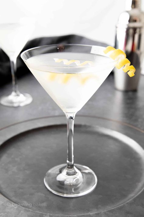 Enjoy the classic flavors of the classic martini, made with this easy recipe with vodka or gin. It's so simple and easy to make! | Recipe at BeamingBaker.com Best Martini Recipes, Martini Recipes Easy, Business Drinks, Cocktails Made With Vodka, Martini Recipes Vodka, Cocktail Tools, Recipe For 1, Classic Martini, Aromatic Bitters