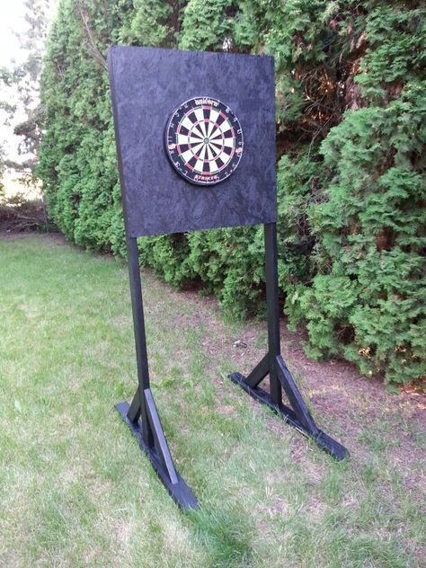 Outdoor dartboard stand. 2x4s and OSB, with 2 coats exterior latex. Diy Outdoor Dart Board, Outdoor Dart Board Ideas, Dart Board Stand, Dartboard Stand Diy, Dart Board Ideas, Outdoor Dartboard, Outdoor Dart Board, Backyard Games Diy, Board Stand