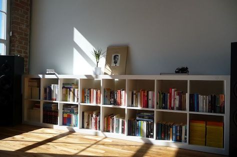 I would love to connect two Kallax shelving units as they did in the above photo. Does anyone have any thoughts on how it was done? Long Low Bookcase, Cube Ikea, Horizontal Bookcase, Ikea Toy Storage, Low Bookshelves, Kallax Shelving Unit, Ikea Regal, Ikea Kallax Regal, Wide Bookcase