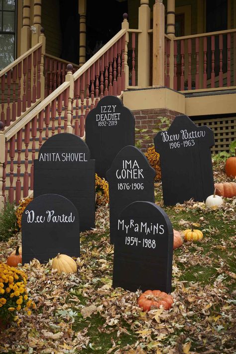 These simple DIY Halloween tombstones require a white paint pen, black paint, and a little inspiration.  #halloween #halloweenideas #diyideas #halloweendiy #bhg Tombstones Diy Halloween, Tombstone Decorations Halloween, Fake Tombstones Diy, Diy Wooden Tombstones Halloween, Headstone Ideas Halloween, Diy Tombstones Halloween Foam, Easy Diy Tombstones Halloween, Tombstone Ideas Halloween, Fake Graveyard Halloween