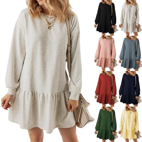 PRICES MAY VARY. Design: This oversized sweatshirt dress for women offers a relaxed fit with a rib knit A-line silhouette for a trendy and casual look. This fall staple boasts a crewneck and long sleeves, making it a fashionable choice for everyday wear or special outings Match: This above-the-knee ruffle sweatshirt dress is perfect for a variety of ensembles. you can wear it with leggings and sneakers for a casual and cozy look, or in the winter with over-the-knee length boots, a scarf, a jacke Womens Long Sleeve Sweater Dress, Fall Teen Dresses, Winter Dresses Outfit, Winter Dresses Casual, Dress And Sweater Outfit, Dress With Sweater Over It, Dress With Leggings And Boots, Oversized Sweatshirt Dress, Sweatshirt Dress Outfit