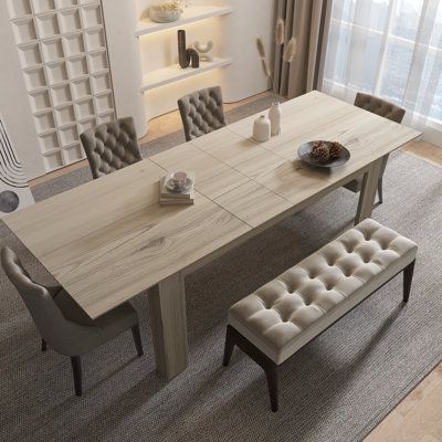 The expandable dining table for 6-8 People is a versatile and practical solution for small kitchens or dining areas. Its space-saving design comfortably accommodates 4-6 people with a compact size of 59", but can be extended up to 87" to seat 8-10 individuals. The extendable dining table's modern rectangular design adds an elegant touch to any dining space. Crafted from high-quality materials like solid wood or engineered wood, this dining table is built to last with stability in mind. The exten Extendable Dining Room Table, Modern Extendable Dining Table, Expandable Table, Space Saving Kitchen, Expandable Dining Table, Table Extensible, Furniture Dining Table, Extendable Dining Table, Furniture For Small Spaces