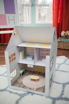 DIY: cardboard box dollhouse #Kids #Paper #Toy Cardboard Box Houses, Cardboard Box Diy, Diy Karton, Cardboard Dollhouse, Pola Kotak, Diy Barbie House, Cardboard Crafts Diy, Cardboard Box Crafts, Cardboard Toys