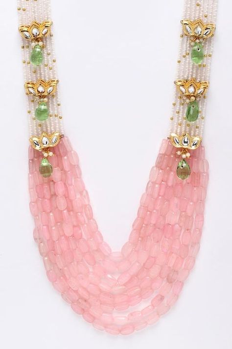 Gold plated multi layered necklace strewn with pearls, natural stones and kundans.
Type: Kundan, Pearls, Natural Stones
Composition: Sterling Silver
Color: Pink, Green, Gold, White
Multi layered
Floral motif
Size (in cms): L x W: 80 x 6
Weight (in gms): 179
Closure: Lobster clasp - Aza Fashions Pink Kundan Necklace, Latest Pearl Necklace Designs, Latest Beads Jewellery Designs, Beaded Wedding Jewelry, Multi Layered Necklace, Coral Jewelry Set, Bridal Necklace Designs, Choker Necklace Designs, Fancy Jewelry Necklace