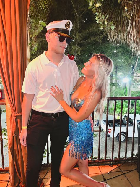 Mermaid And Sailor Halloween Costume, Salor And Mermaid Costume, Under The Sea Couples Costume, Mermaid Sailor Couple Costume, Pirate And Mermaid Costume Couple, Captain And Sailor Couple Costume, Mermaid And Sailor Costume Couple, Mermaid Couples Costume, Mermaid And Captain Costume