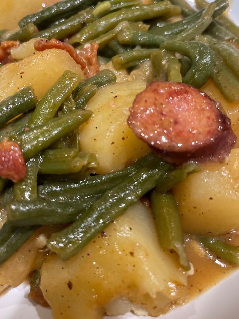 Smothered Green Beans with Bacon and Andouille Sausage Easy Smothered Green Beans, Smoked Sausage Green Beans Potatoes, Smothered Green Beans With Sausage, Portuguese Green Beans And Linguica, Potato Green Beans And Sausage, Potatoes Green Beans Sausage, Meals With Green Beans, Sausage Potatoes Green Beans, Beans Dishes