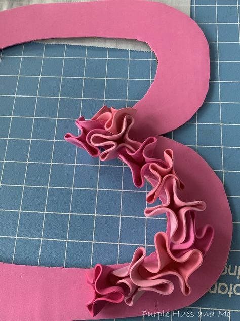 Dress up any door or wall with this adorable ruffle wreath! And it's not just for Valentines, either! Just change the shape of the cardboard base! I love crafting with foam sheets - also called eva foam! They can be shaped and manipulated with heat into lovely creations - I think so much better and easier than using felt or paper! And the best part, it's totally a recycle craft starting with a cardboard box and newspaper! And you won't believe how easy it is to make!   Let's get starte… Paper Marigolds, Cardboard Wreath, Diy Paper Flower Wall, Heart Shapes Template, Ruffle Wreath, Recycle Craft, Paper Flower Wall Art, Crafts 2023, Foam Sheet Crafts