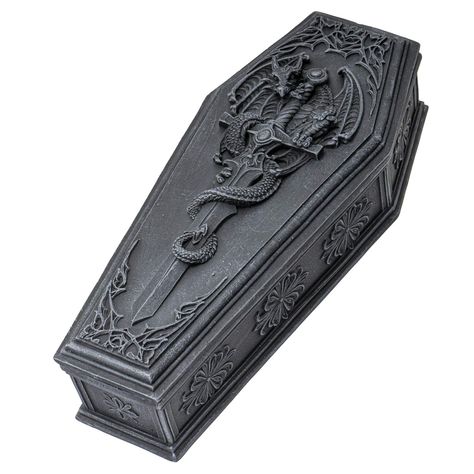 PRICES MAY VARY. Beautifully sculpted coffin box with a relief dragon sword sculpted on the lid of the keepsake box Made of high quality composite resin material and hand painted, the wall plaque measures 4" tall, 10" long and 4.5" wide and weighs around 2 lbs A beautiful dragon wrapping itself around a sword sits atop a gothic coffin lid, keeping a close guard over the treasures hidden within. Makes an enchanting addition to any home or office that makes use of Medieval and Gothic décor. This p Gothic Coffin, Gothic Dragon, Nick Nacks, Coffin Box, Clothing Art, Halloween Vampire, Beautiful Dragon, Gothic Horror, Dark Gothic