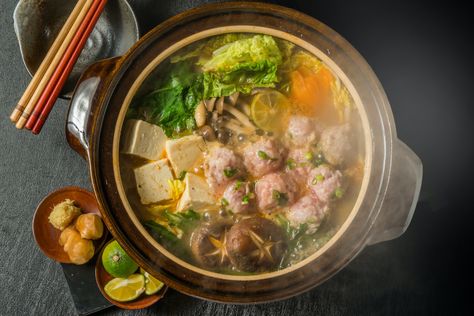 Yosenabe Recipe: How to Make the Seafood and Veggie Hot Pot - 2022 - MasterClass Hotpot Soup Base Recipe, Japanese Hotpot, Seafood Hot Pot, Japanese Hot Pot, Frozen Dumplings, One Pot Dishes, Dinner Guests, Chinese Cabbage, Leafy Vegetables