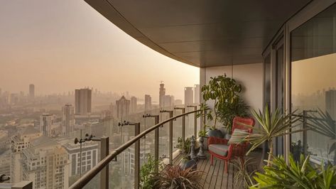 Mumbai: Views of the city skyline give this apartment an international look | Architectural Digest India Mumbai Skyline, High Rise Apartment, City View Apartment, Cityscape Wallpaper, Colourful Living Room Decor, Concept Model, High Rise Apartments, Balcony Plants, Flat Apartment