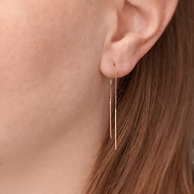 These long drop earrings gold with sleek design, these linear drop earrings add a feminine accent to any style. Pair them with your casual or formal attire. Black Onyx Hoop Earrings, Minimalist Gold Earrings, Gold Threader Earrings, Jewelry Presentation, Black Diamond Earrings Studs, Threader Earrings Gold, Bridal Party Jewelry, Minimalist Earrings Gold, Twisted Bangle