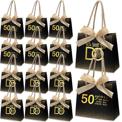 PRICES MAY VARY. Generous Pack: celebrate half a century of marital bliss with this set that includes 25 double sided 50th anniversary bags; With this substantial quantity, you can share these elegant gift bags with your family and friends, elevating the celebration and making everyone a part of this significant milestone Suitable Sized: measuring about 5.51 inches/ 14 cm in length, 2.36 inches/ 6 cm in width, and 4.72 inches/ 12 cm in height, these 50th anniversary gift bags are tailored to fit 50 Anniversary Gift Ideas, 50th Anniversary Party Ideas Decoration, 50 Wedding Anniversary Party Favors, 50th Anniversary Party Favors, 50th Anniversary Party Decorations, 50 Years Anniversary Gift, Party Goodie Bags, Anniversary 50th, 50 Golden Wedding Anniversary