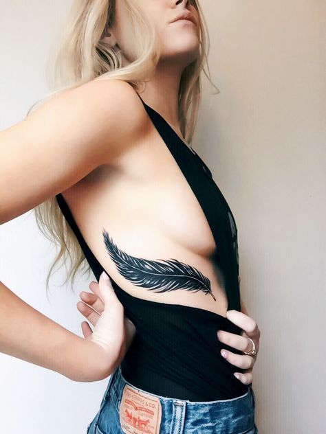 Black and white ink. Father tattoo. Rib tattoo. Cover up.  #tattoo #feather #ribs Feather Tattoos On Side Ribs, Name Cover Up Tattoos For Women Ribs, Rib Tattoo Coverups For Women, Cover Up Tattoos For Ribs, Rib Feather Tattoo, Rib Feather Tattoos For Women, Feather Tattoo On Ribs For Women, Tattoo Cover Up Ribs, Feather Tattoo Ribs