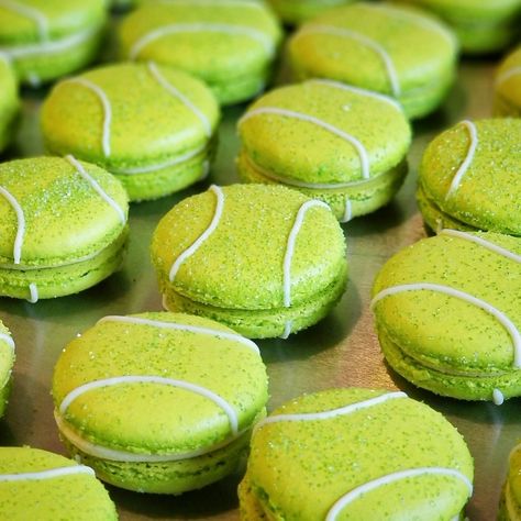 Tennis ball macarons with sanding sugar and white chocolate, birthday cake flavored filling Tennis Themed Birthday Cake, Tennis Ball Macarons, Wimbledon Party Decorations, Tennis Macarons, Tennis First Birthday, Tennis Party Food, Tennis Bridal Shower Theme, Tennis Birthday Cake, Tennis Cakes