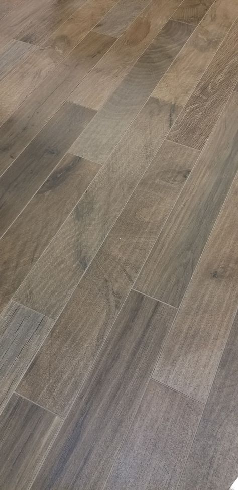 Straight from the showroom floor! One of our favorite wood-look tiles is Woodker Brown. It's the perfect mix of brown, taupe, and gray. . . . #unitedtileco #shoplocal #shreveportremodeling #bossierremodeling #edimax #woodker #brown #woodlooktile #tile #flooring #interior #woodlook #renovationproject #tiles #interiordesign #porcelaintile #design #woodtile #porcelain #ceramics #wood #tileinstallation #bathroomdesign #tilefloor  #grain #natureinspired Brown Tile Bedroom Ideas, Wood Tile Floor Whole House, Grey Brown Flooring Kitchen, Brownish Grey Flooring, Brown And Grey Flooring, Brown Floor Tiles Bathroom, Gray And Brown Flooring, Woodlook Floor Tiles, Brown Gray Flooring