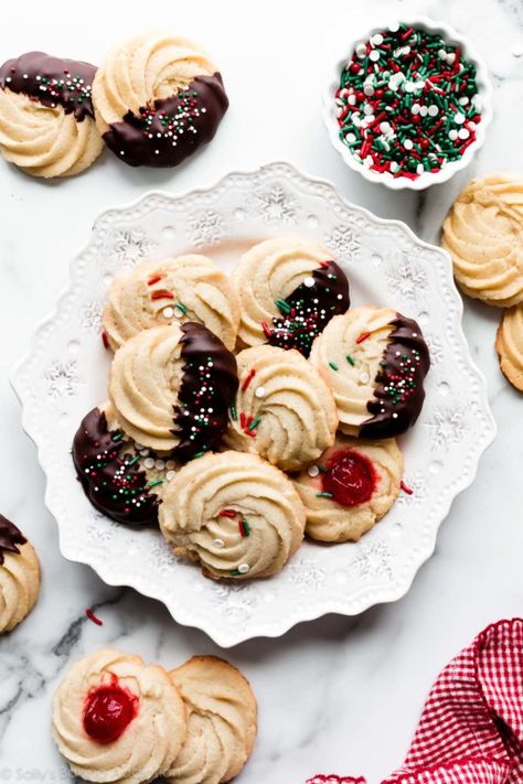 These homemade Christmas butter cookies are extra soft and buttery with delicious vanilla almond flavor and a dunk in dark chocolate. Pipe into desired designs or even use a cookie press! Recipe on sallysbakingaddiction.com Danish Butter Cookies Recipe, Butter Cookie Recipe Easy, Cookie Recipe Video, Danish Butter Cookies, Plain Cookies, Sally's Baking, Spritz Cookies, Butter Cookies Recipe, Best Christmas Cookies