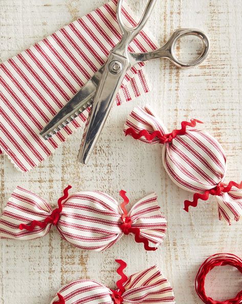 craft made from striped red and white fabric made to look like oversized peppermints December Crafts, Red Christmas Ornaments, Easy Holidays Crafts, Peppermint Christmas, Homemade Christmas Decorations, Christmas Craft Projects, Christmas Crafts To Make, Easy Christmas Crafts, Handmade Christmas Decorations