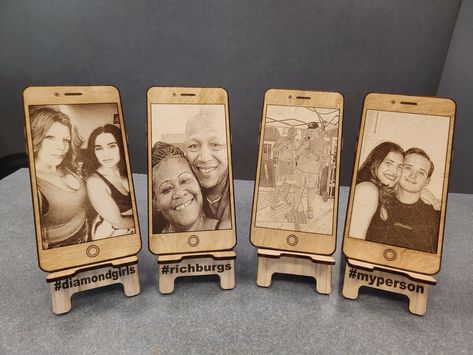 It's time to bring that favorite selfie to life. Whether for the desk or hanging on the wall we can make ya a gift that never fades. Laser engraved cell phone frame with your photo in the screen. Included is the personalized hastag easel for easy display on any desk or shelf.  Laser cut from 1/8th inch birch for light weight and durability. Upload photo via convo here at Etsy or directly at lazeritnow@gmail.com Measures 7x3.7inches Wall hangings are available upon request.  Just convo for sizes and prices. Laser Photo Engraving, Laser Engraved Photo On Wood, Wecreat Vision Laser Projects, Coaster Display, Phone Frame, College Photography, Laser Engraved Gifts, Laser Engraved Ideas, Cut Photo