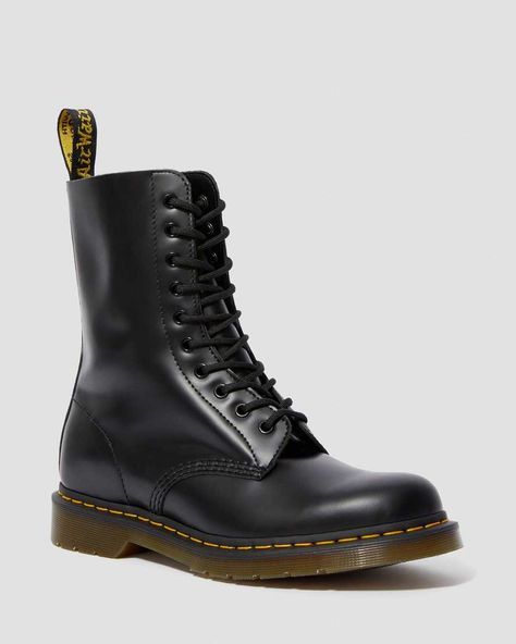 The 1490 10-eye boot is a classic Dr. Martens punk silhouette — laced even higher for an amped-up attitude. 10-eye boot Made with classic Doc's DNA, including grooved edges, yellow stitching and heel-loop Built on the iconic Dr. Martens air-cushioned sole, which is oil and fat resistant, with good abrasion and slip resistance Upper: 100% Leather Lining: 75% Textile, 25% Leather Sole: 100% PVC Punk Silhouette, Cherry Red Dr Martens, Red Dr Martens, High Lace Up Boots, Leather High Boots, Leather Mid Calf Boots, Dr Martens Chelsea, Dr Martens Womens, Black Dr Martens