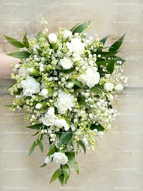 Stunning Teardrop/Cascading Wedding Bouquet Arranged With: White Lily Of The Valley, White Gypsophila (Baby's Breath), White Carnations + Green Foliage Lily Of The Valley Bride Bouquet, White Teardrop Bouquet, Green And White Wedding Bouquet Cascade, White Wisteria Bouquet, Teardrop Wedding Bouquet, Lily Of The Valley Bridal Bouquet, Carnation Wedding Bouquet, Lily Of The Valley Wedding Bouquet, Cascade Wedding Bouquet