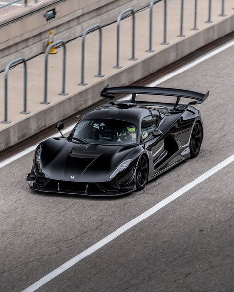 The track-focused @hennesseyperformance Venom F5 Revolution has set a new production car lap record at Circuit of The Americas, and a 300mph attempt is up next. Read the story at the link in our bio. #evomagazine - - - #Hennessey #HennesseyVenom #VenomF5 #HennesseyVenomF5 #COTA #Circuitoftheamericas #HennesseyPerformance Hennessey Venom F5, Hennessey Venom, Stanced Cars, Circuit Of The Americas, Power Cars, Car Graphics, Racing Stripes, Futuristic Cars, American Cars