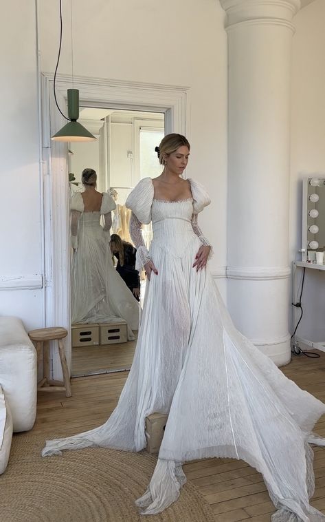 Stunning wedding dress with statement sleeves and draped a line skirt. The macye dress by cinq bridal Unique Sleeved Wedding Dresses, Juliette Sleeve Wedding Dress, Long Sleeve Unique Wedding Dresses, Drop Waist Long Sleeve Wedding Dress, Detachable Sleeves For Wedding Dress, Cinq Bridal Dresses, Edgy Wedding Dress Unique, Gauzy Wedding Dress, Dramatic Sleeve Wedding Dress