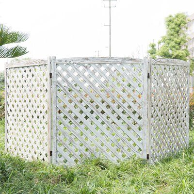 Add decorative charm and functional fencing to your garden with this 3-panel whitewashed wood trellis. This fence is great for obscuring items, such as trash bins and air conditioning units, or for helping keep animals out of flower and vegetable gardens. Featuring a vintage whitewashed finish to complement rustic and country farmhouse style, this decorative wood garden fence enclosure will bring unique stylish charm and privacy to your garden. Our sophisticated folding fence enclosure will acce Wood Trellis Design, Lattice Privacy Fence, Outdoor Privacy Fence, Lattice Privacy Screen, Outdoor Privacy Screen, Fence Screen, Privacy Fence Screen, Lattice Wall, Wood Trellis