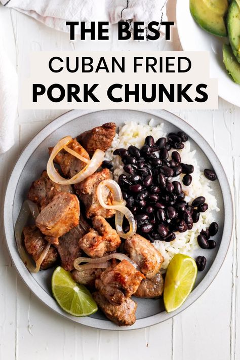 An overhead shot of a plate with Masitas de puerco and white rice and black beans with the words "the best cuban fried pork chunks" in the foreground Cuban Fried Pork Chunks, Fried Pork Chunks Puerto Rican, Pork Chunks Recipes Instant Pot, Cuban Pork Chunks, Pork Black Beans And Rice, Pork Shoulder Chunks Recipes, Cuban Pork Recipes, Pork Chunks Recipes Easy, Pork Chunks Recipes