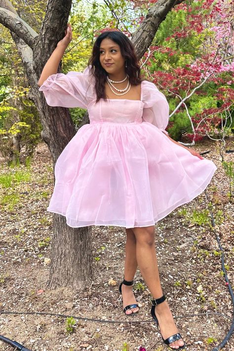 Pink Organza Babydoll Dress This is the babydoll dress for a dramatic, pink-loving princess. It's made entirely of high-quality sheer organza fabric, which makes it the puffiest, most dramatic babydoll dress in all of our collections! The skirt is made of three layers and the top is double-layered. Both the sleeves and top maintain their sheerness. All of the seams are inside the layers to prevent fraying and itchiness. The elastic at the bottom of the sleeve creates a ruffle effect at the elbow Babydoll Dress Pattern, Babydoll Dress Outfit, Bubblegum Pink Dress, Pink Babydoll Dress, Puffy Sleeve Dress, Puffy Dresses, Feminine Women, Black Femininity, Hot Pink Dresses