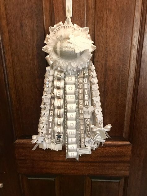 Homecoming garter White Garter Homecoming, Guys Garter Homecoming, Garter Homecoming Ideas, White And Gold Garter Homecoming, All White Homecoming Mum, White And Gold Homecoming Mum, White And Silver Homecoming Mum, Blue And White Mums Homecoming, Garter Mums Homecoming