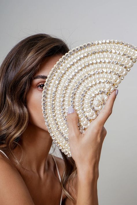 Clutch is designed in a semi-circular shape, and features hand-embroidered. This evening bag is made of high quality pearls. #pearl #clutchbag #embellishment #women #partywear Fancy Clutch Purse, Embroidered Clutch Bag, Fancy Clutch, Hand Beaded Bag, شال كروشيه, Bridal Handbags, Bridal Purse, Unique Handbags, Embellished Bags