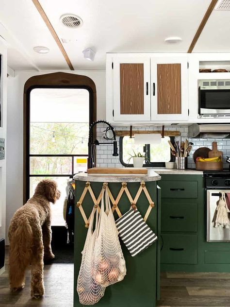 Green Cabinets In Camper, Funky Camper Remodel, Camper Murphy Bed Diy, Lake House Camper Decor, Dark Green Camper Cabinets, Rv Decorating Ideas Green, Camper Interior Hacks, Camper Renovation Living Room, Decorate Rv Rv Interior