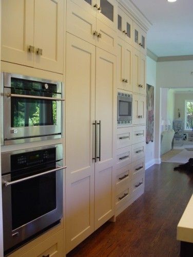 cabinet-front fridge, stacked double oven Hidden Fridge, Gourmet Kitchen Design, Fridge Design, Wall Ovens, Pantry Wall, Eclectic Kitchen, Kitchen Remodel Design, House System, Ideas Pictures