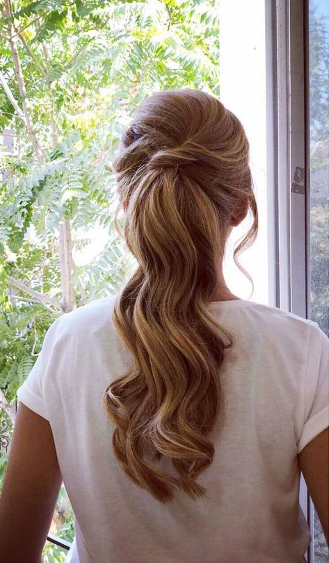 Ponytail hairstyle Embrace the power of the Ponytail. PONYTAIL hairstyles aren’t only for the gym. You can style for a formal event or a... Pony Tale Updo, Ponytail With Veil, Pony Tailed Hairstyle Wedding, Elegant High Ponytail, Long Curly Hair Color, Formal Ponytail, Ponytail Wedding, Wedding Ponytail Hairstyles, Curly Hair Color