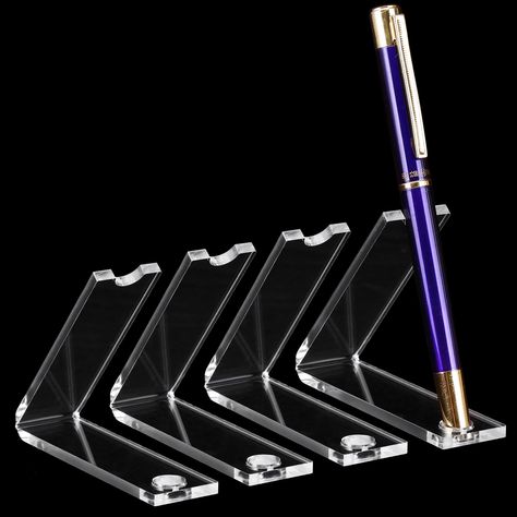 PRICES MAY VARY. Sufficient Quantity: You will receive 4 pieces clear pen holders, each has a size of 3.3 x 0.95 inch, a height of 2.6 inches, and an aperture of 0.39 inch; The compact and convenient display stand occupies a very small space and is suitable for placement on desks, bookshelves, and showcases Practical Function: the pen display rack adopts a simple and stylish vertical design with strong stability; The vertical design makes the display consistent with the handheld style, which is Work Organizer, Pen Display, Pen Stand, Desk Supplies, Vertical Design, Makeup Brush Holders, Work Organization, Display Rack, Home School