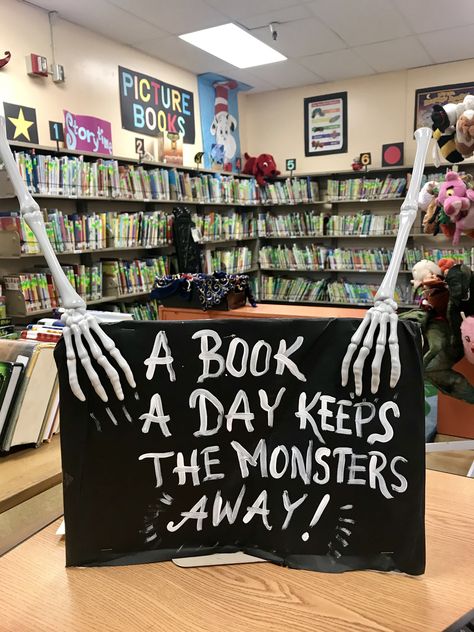 Haunted Library Trunk Or Treat, Halloween Display Case School, Halloween Book Displays Library, Spooky Library Displays, Magic Halloween Decor, Book Return Box Ideas, Halloween At The Library, November Library Display Ideas, Mystery Book Display