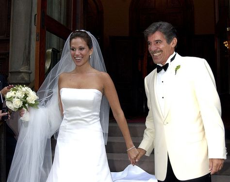 The 2000s saw the rise of the strapless wedding dress, with early aughts brides like Jessica Simpson, Carmen Electra, and  Erica Levy (pictured here) choosing the trendy silhouette. Early 2000s Wedding Dress, 2000s Bride, 2000 Wedding Dress, 2000s Wedding Dress, Jessica Simpson Wedding Dress, 2000s Wedding, Jessica Simpson Wedding, Most Expensive Wedding, Most Expensive Wedding Dress