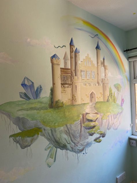 Children’s room mural painting of a hand painted magical castle in the sky. Floating islands, a rainbow, clouds, crystals, whimsical bridges connecting floating islands. Turrets, draw bridge, thick castle walls, fairy tale in a boy’s bedroom hand painted onto the wall. Custom mural paintings for homes and commercial premises, doctors’ offices, kindergartens, schools, hospitals. Castle Wall Painting, Kids Bedroom Paint, Castle Mural, Sky Mural, Castle Nursery, Childrens Wall Murals, Girl's Rooms, Kids Room Wall Murals, Magical Castle