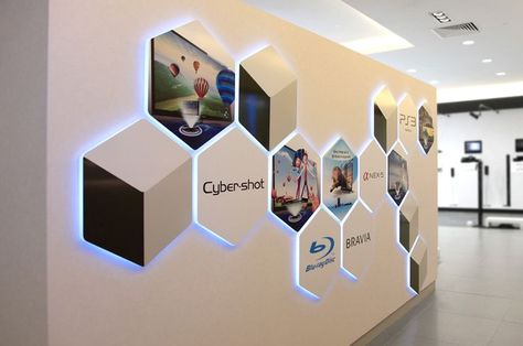 Interesting back-lit wall signage for SONY Creative Office Interior Design Ideas, Exhibit Wall Design, Interactive Wall Design Office, Branding Wall Design Offices, Office Foyer Design, Interactive Office Wall, Booth Wall Design, Wall Branding Ideas, Wall Signage Design