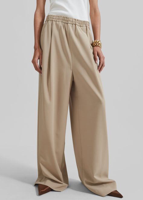 Cream wide leg trousers