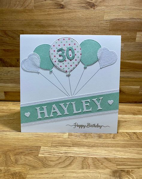 "Lovely handmade personalised Birthday card. Pale green, pink and white heart and spotted balloons design with age in green, personalised white glitter lettering and happy birthday in silver. Please note: for longer names the font may need to be reduced slightly to fit. Please enter the name you require in the personalisation section and choose the age from the variations available. All cards are made with Non shed Glitter!! Card size 7\"x 7\" Quality White card supplied with a white envelope an Birthdays Cards, Balloons Design, Handmade Greeting Card Designs, Happy Birthday Cards Diy, Birthday Cards For Brother, Birthday Card For Her, Sister Birthday Card, Birthday Card Craft, Birthday Cards For Boys